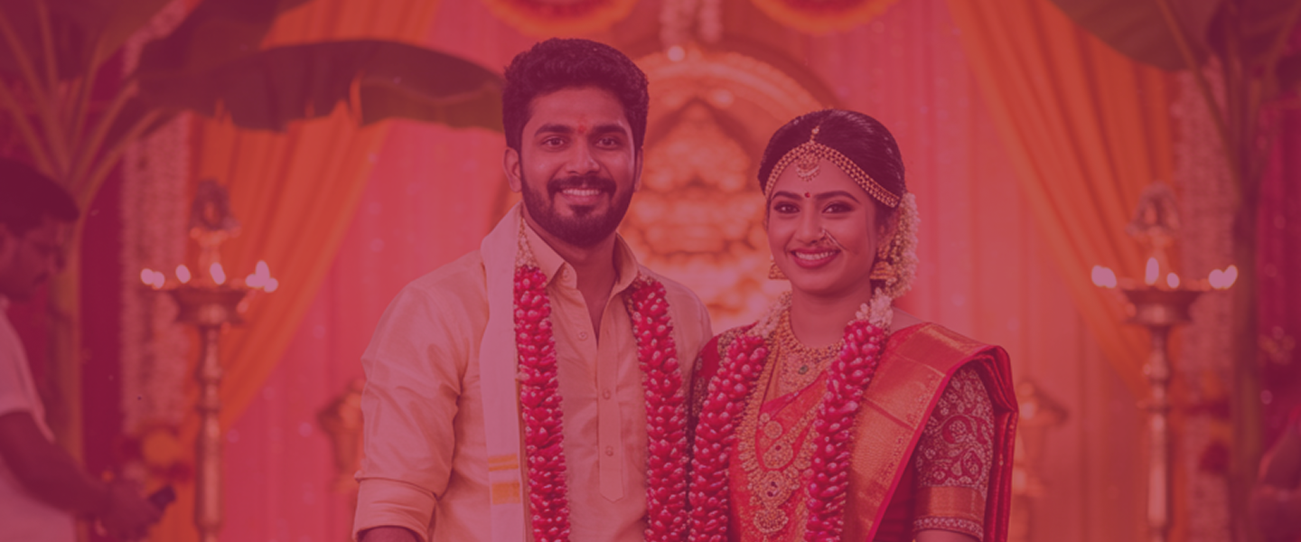 A couple smiling at their wedding